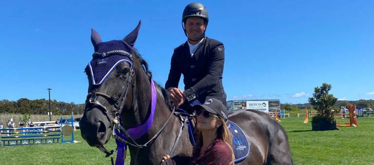 Brook and Angela Dobbin posing after a ribbon ceremony.
